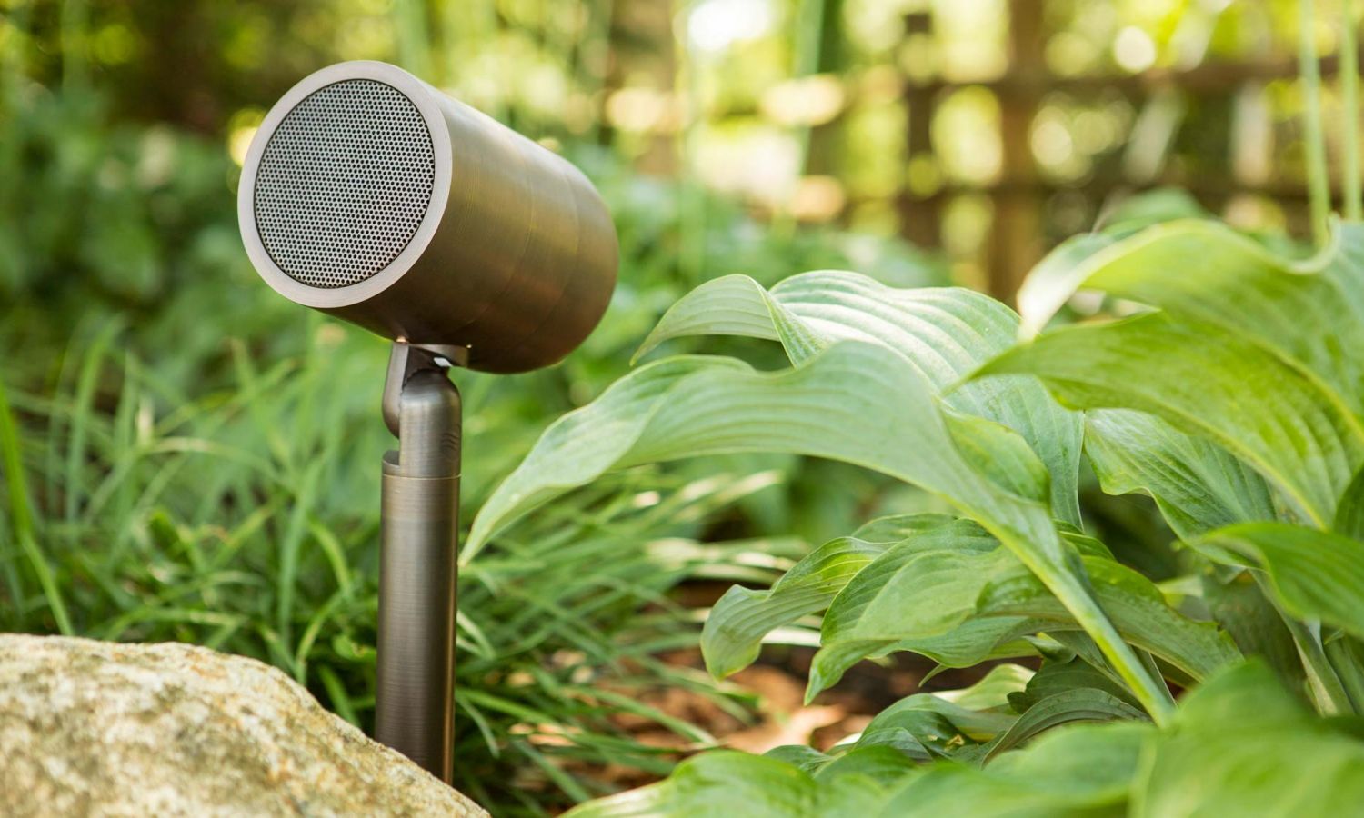 close up of a brushed bronze outdoor speaker by Coastal Source